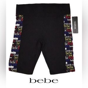 NWT bebe Sport Shorts, Tummy Panel, Side Logo Panels, Black, Size Medium